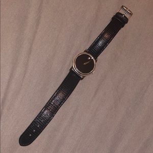 Silver and black leather Movado watch